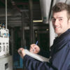 HVAC technician going through checklist
